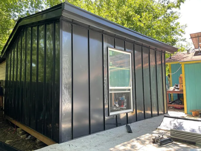 Black standing seam metal wall panels for Metal Roof Installation in Raynham