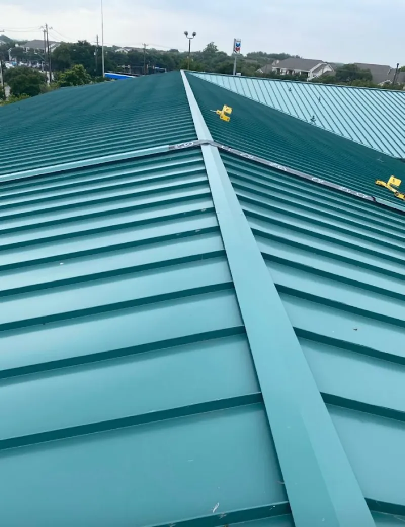 Green commercial metal roof ridge and valley for Metal Roof Repair in Raynham