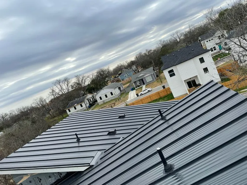 Standing seam metal roof panels with vents for Skylight Repair in Raynham